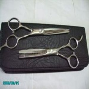 02-60特殊鋼合金研磨剪髮剪刀打薄刀組：刀鋒長6.5cm。